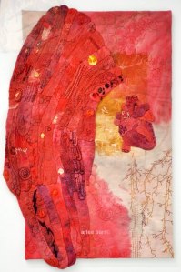 The Weight She Carries, 2014, hand embroidery, natural and synthetic dyes, rust, 24x40"